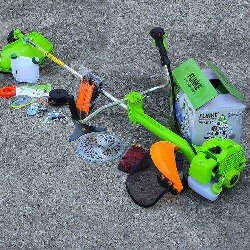 Petrol grass trimmer with accessories